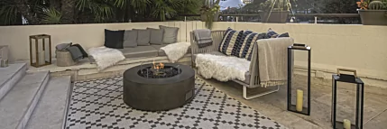 EcoSmart Fire Ark 40 fire table creates a warm and inviting area in a hospitality environment.