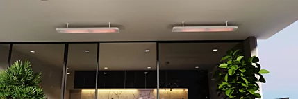 Heatscope Vision 3200W Radiant Heater mounted above patio seating in a private residence, delivering discreet electric warmth.